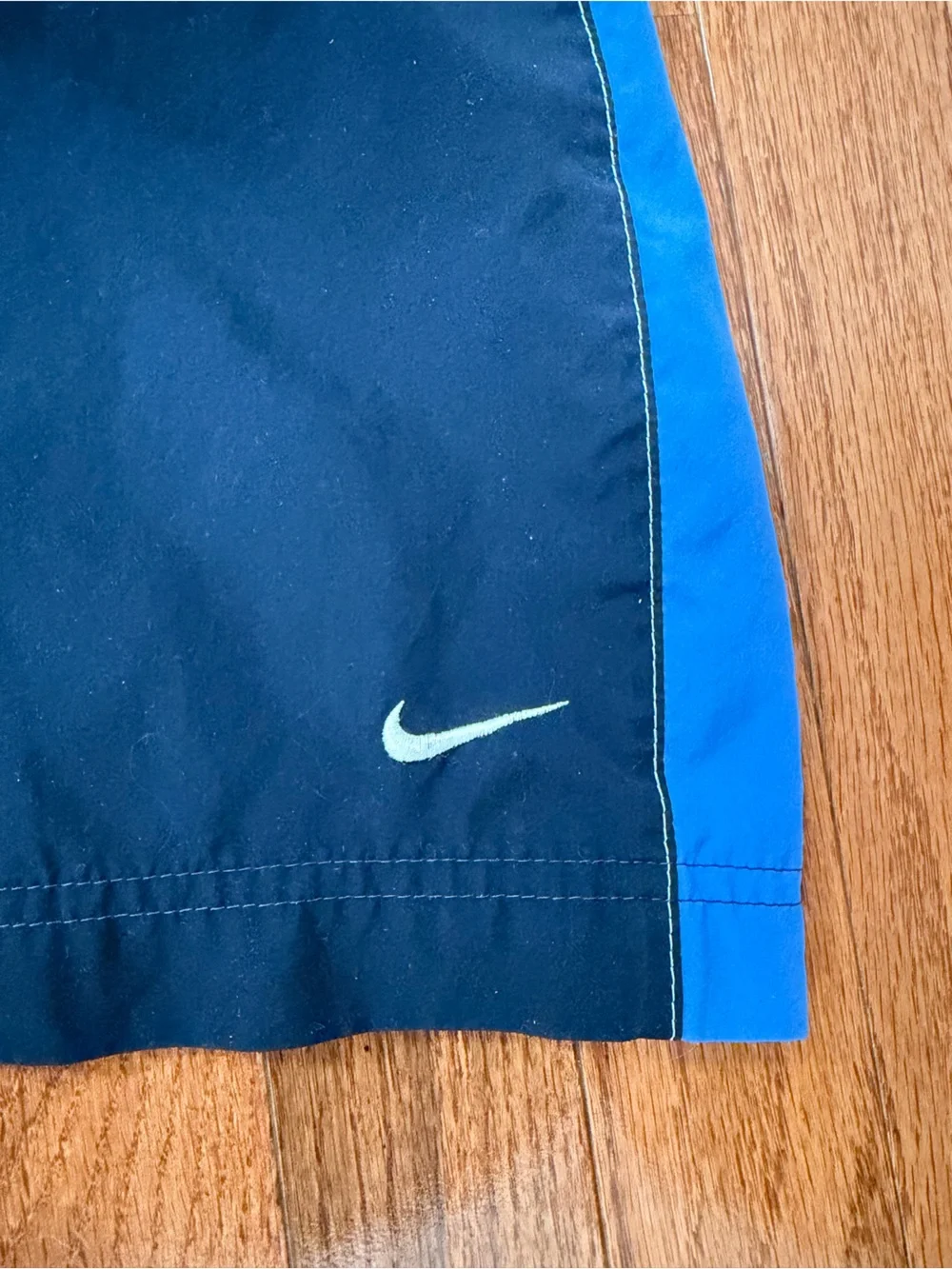 Nike Black Track Pants with Blue Side Stripes